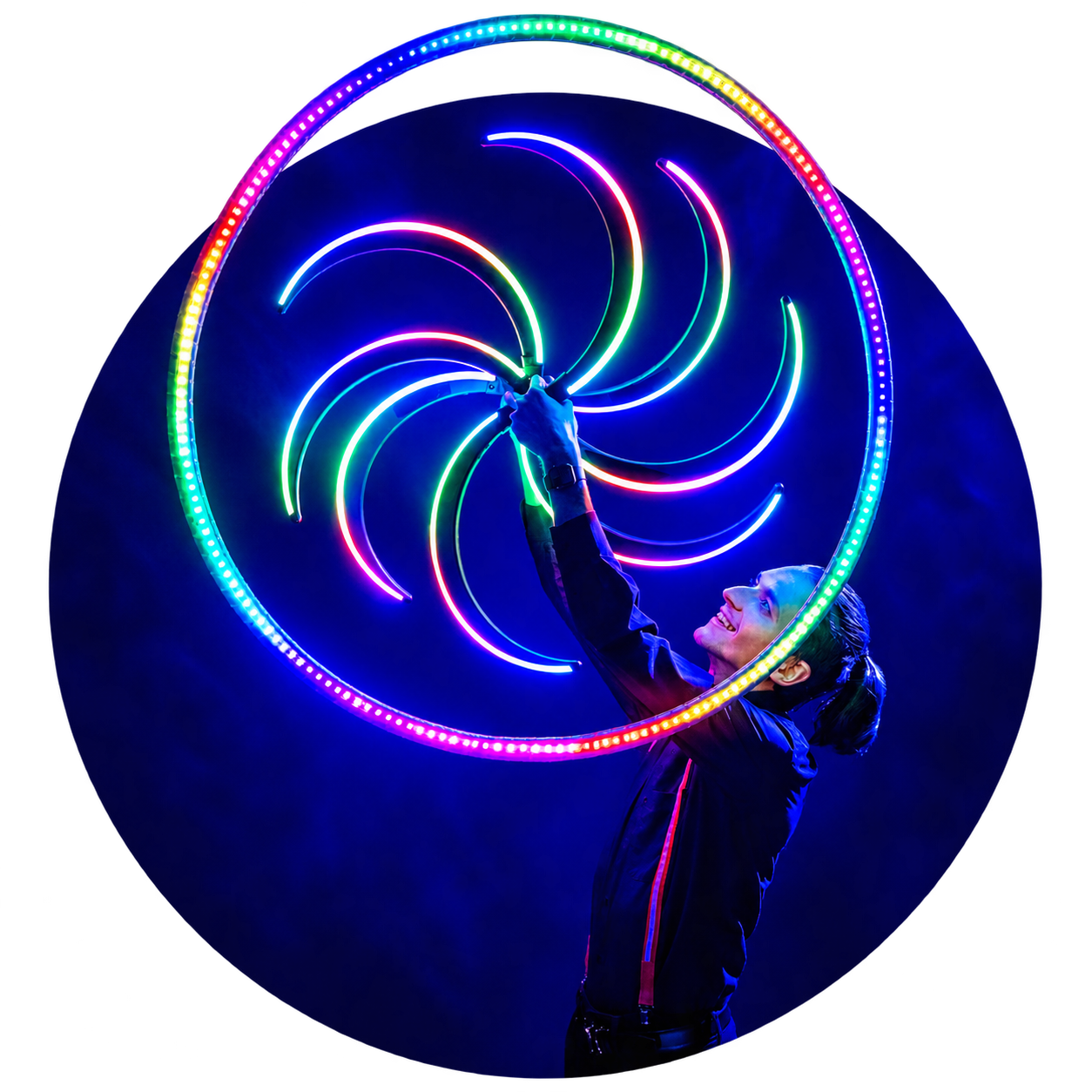 Performer holding illuminated rings in a spiral pattern under blue lighting